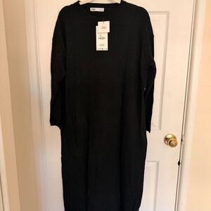Zara long-sleeved oversized black midi dress.